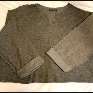 long sleeved gray shirt